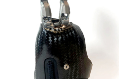 This activity specific 14ELMT custom prosthesis was designed to assist the wearer in utilizing long handled garden tools. The contoured brace on the palmar side allows for better grip of tools.